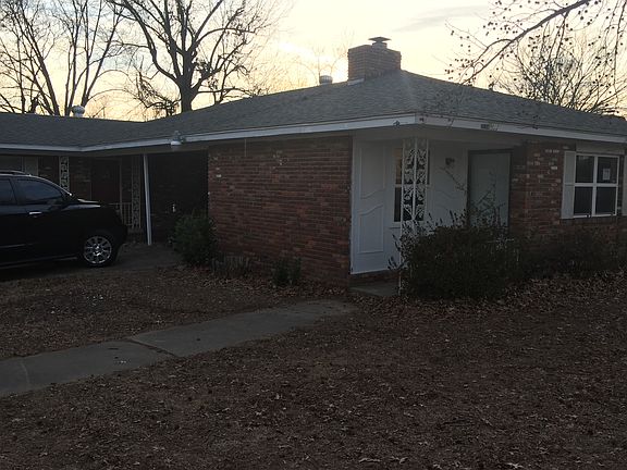 Carport w/ Laundry Room