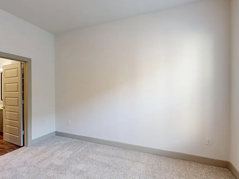 Apartment Bedroom room with Carpet Floor.