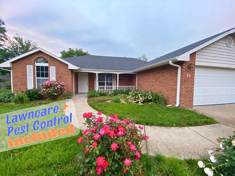 Welcoming front of the home with a covered front porch. Basic lawn care and pest control included!