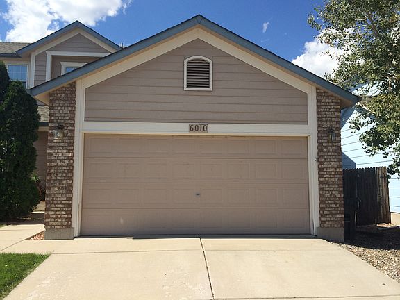 2-Car Garage & Drive