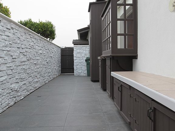 Side way with surfboard storage