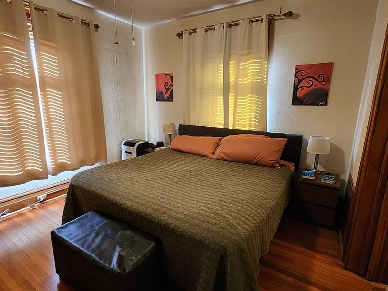 Bedroom with original pocket doors