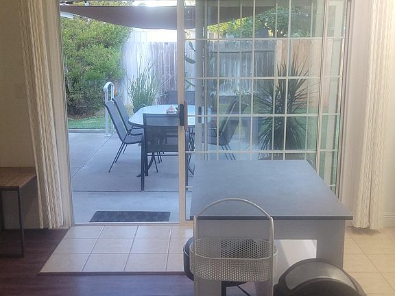 Looking out the slider to back yard