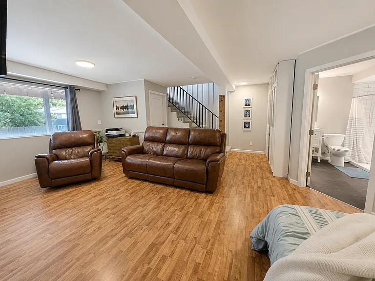 Family Room - Daylit Basement - Gas Fireplace - Large amount of Storage - Murphy Bed/Desk Office Area interchangeable - Adaptable for use as a Guest Suite with its own Bathroom.