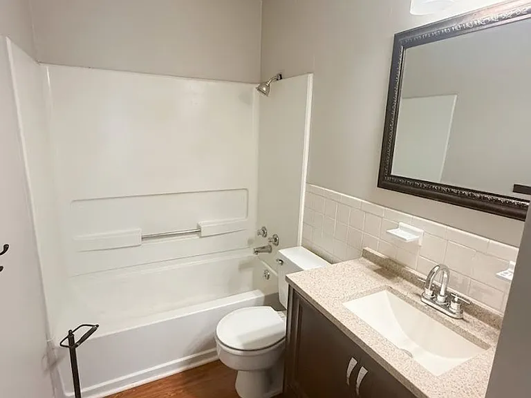 7031 NW Chapel Woods Ln — Photo 12