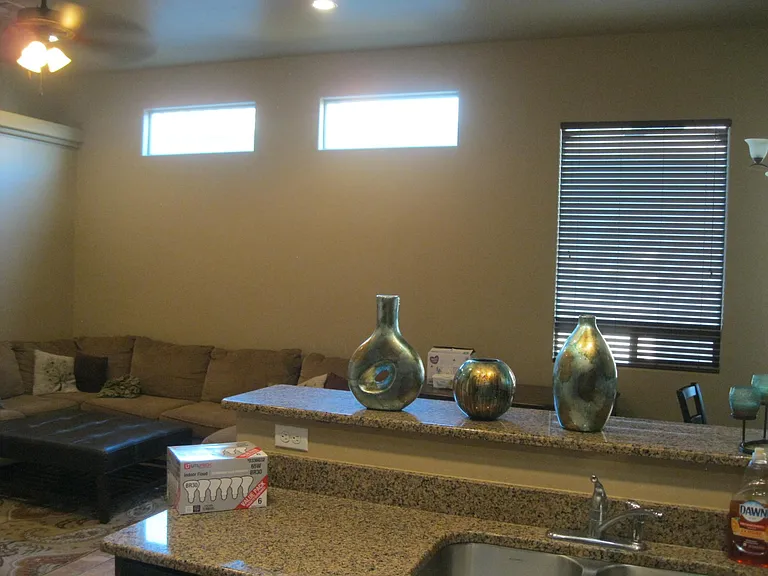 Kitchen overseeing family area