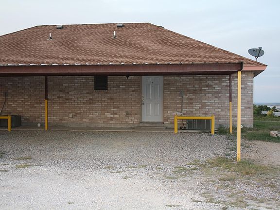 2 vehicle carport at back door