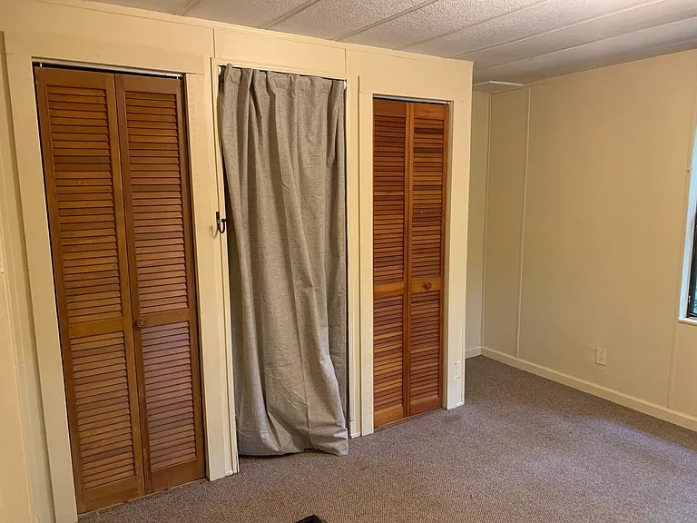 Bedroom number one with lots of closet space.