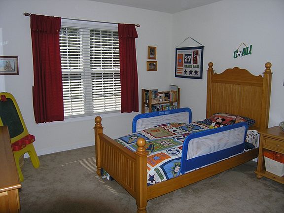 One of Three Additional Bedrooms