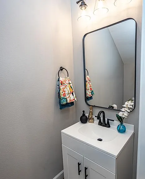 Half-bathroom vanity on main level