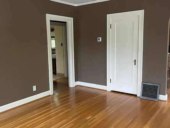 living room, huge closet at entry, doorway to main floor bath & bedrooms