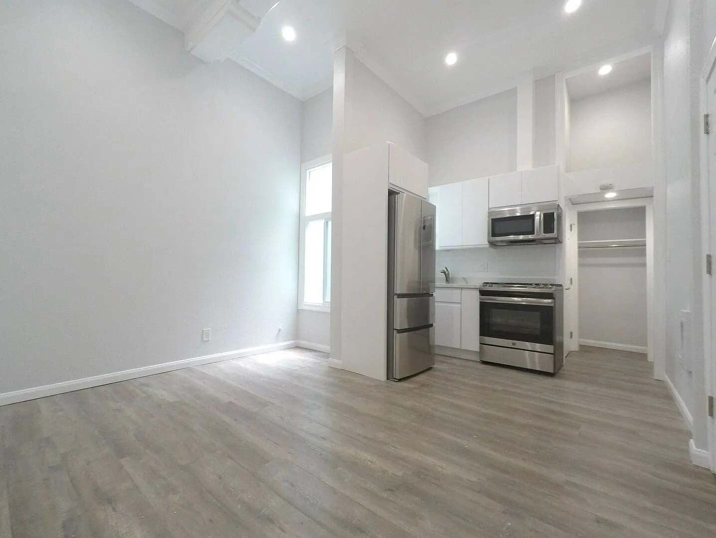Modern Top-Floor Studio | 16-Foot Ceilings | Renovated | Utilities Included — Photo 2