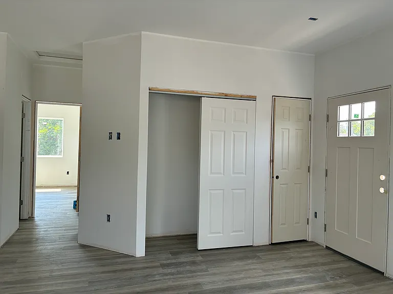 Large entryway storage closet.