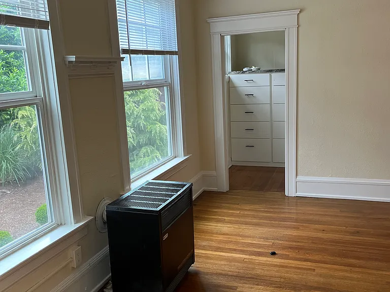 Looking from kitchen toward area with built in dresser