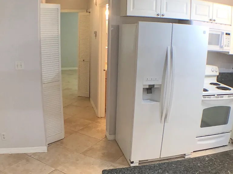 View towards two bedrooms in main part of the house.
