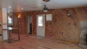 View from within living rm towards front door-kitc