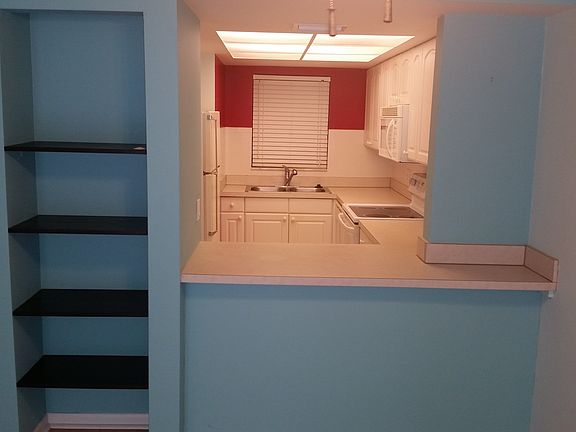 Pass through and bar looking into kitchen