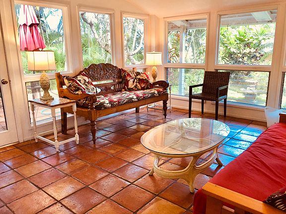 Living-room area overlooking Koi-pond