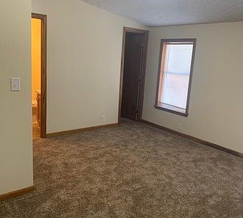Master bedroom with full bath and walk in closet.