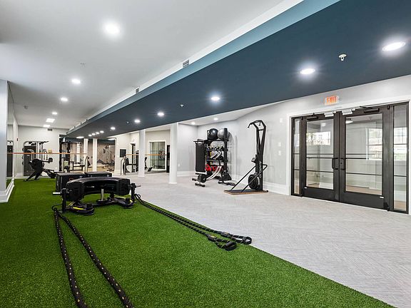 Brand new expanded fitness center with TRX and cardio-theater equipment