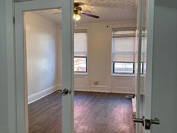 French doors from living room into bedroom