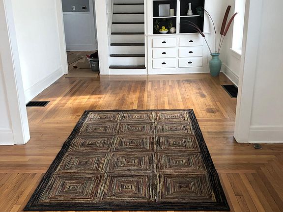 Living and dining room. Refinished hardwood floors