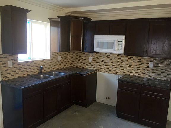 4th image of 9521 Zamora Ave