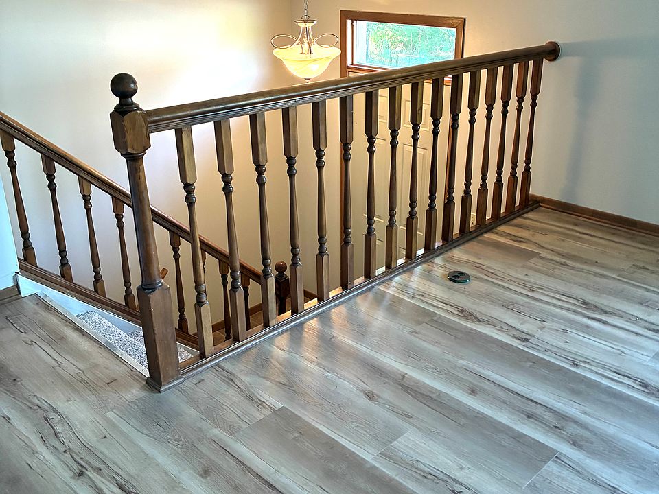 Stairs from front door to great room