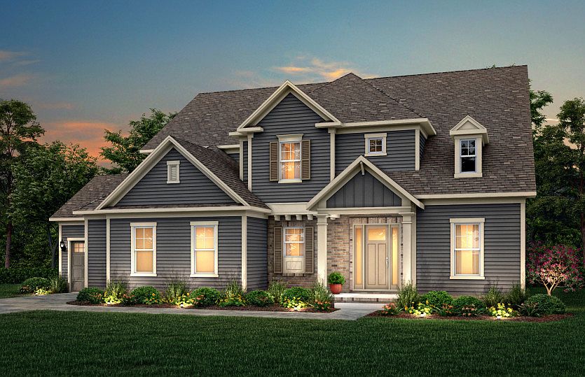 Barrington Exterior 1 features hardie siding, brick, covered front door and 3 car sideload garage