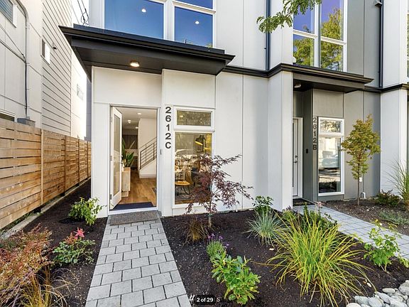 Wide angle street view perspective of townhouse