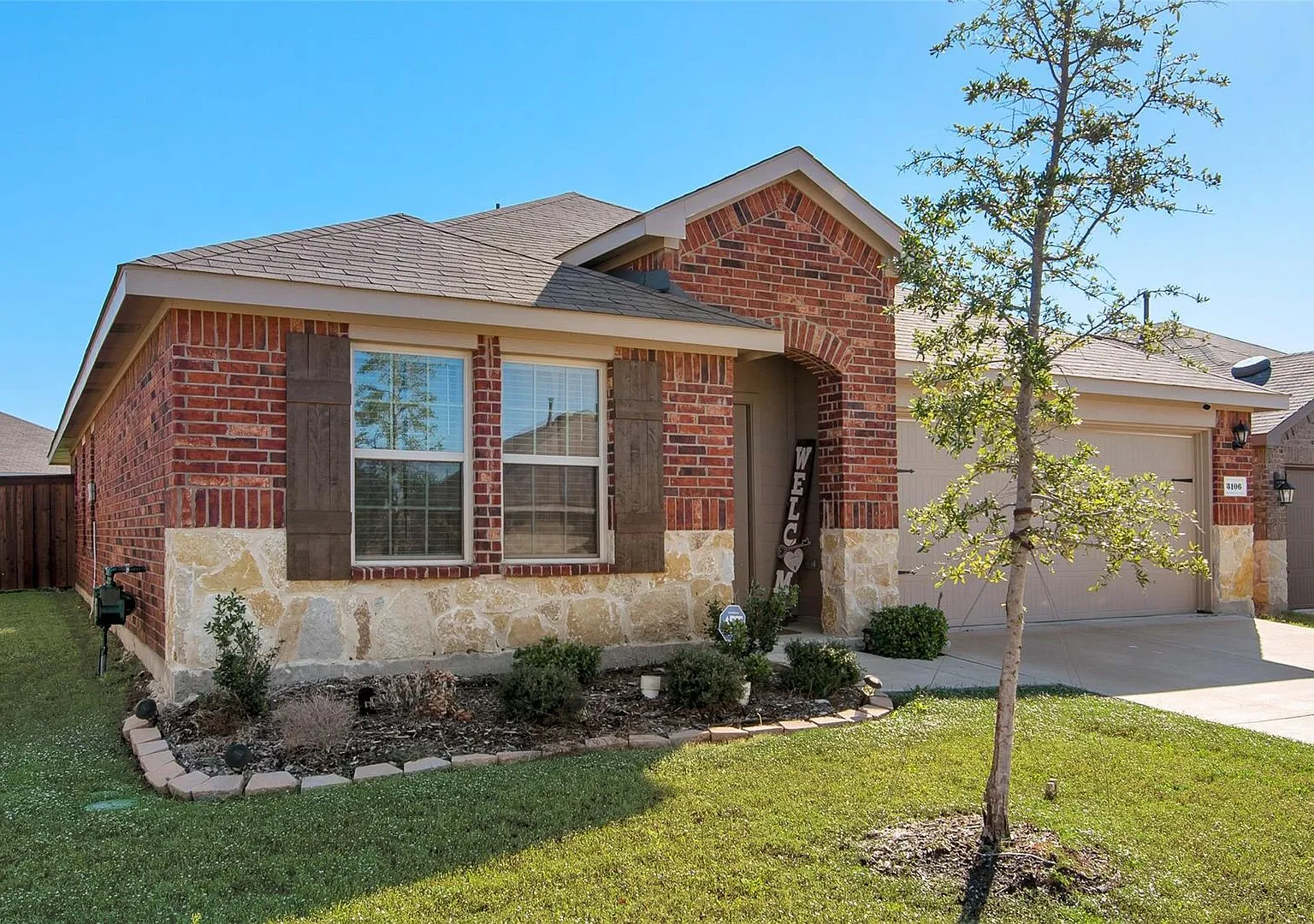 This 4-bedroom, 2-bath home is nestled within a pristine master-planned community and offers mode... — Photo 3