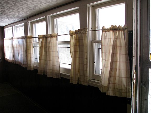 windows to den/additional room back of house