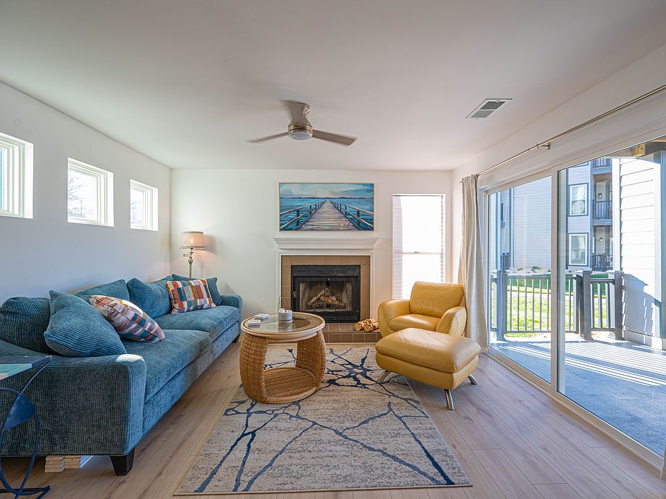 Living room and wood burning fireplace.