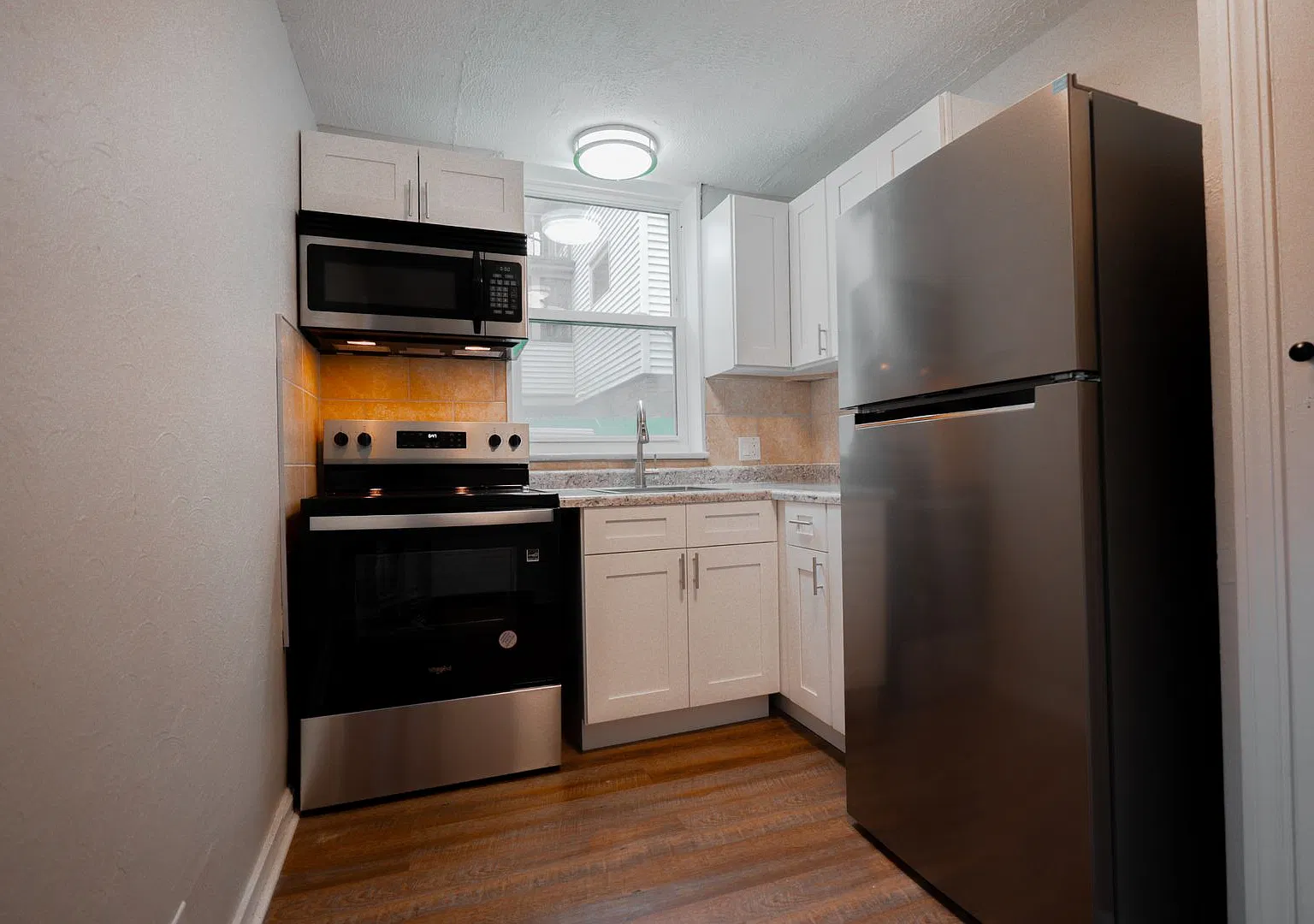 Beautifully Renovated 10 Unit Apartment Complex — Photo 2