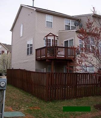 Back yard with deck, fence and patio