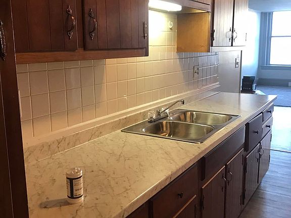 New countertops and undercabinet lighting for well lit sink area.
