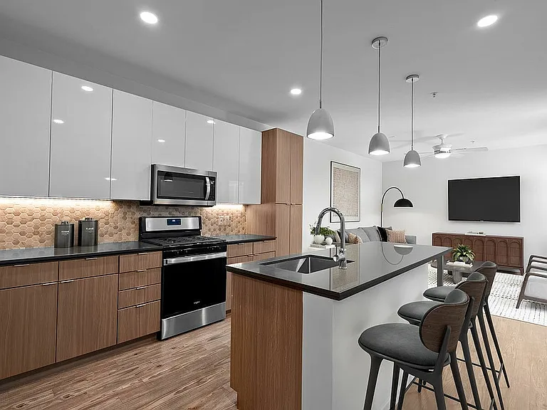 1 Bedroom Apartment Living Room and Kitchen at Sugarmont Apartments in Sugarhouse Utah