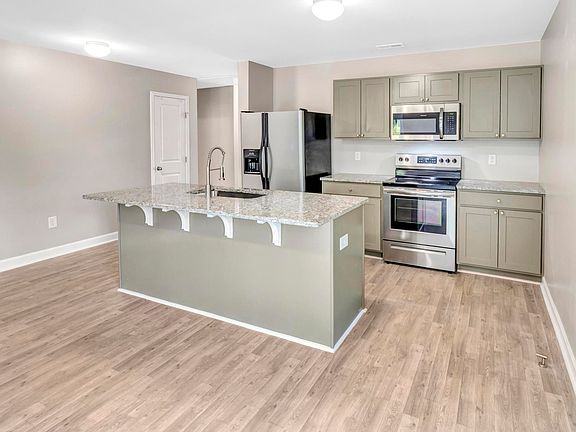 Open Kitchen to Living and Dining
