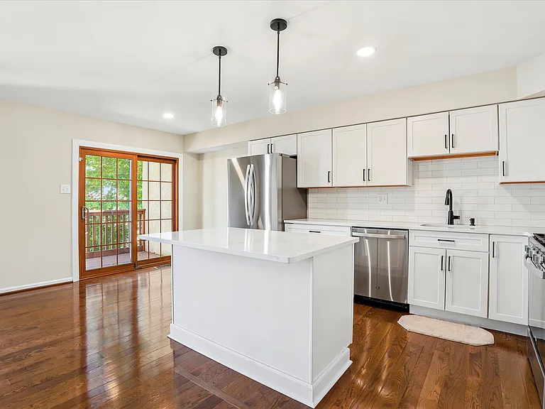 New Kitchen & View of Breakfast Room & Access Deck