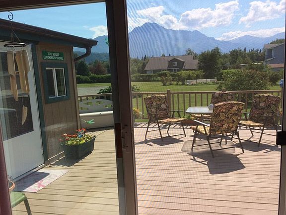 Deck with hot tub house