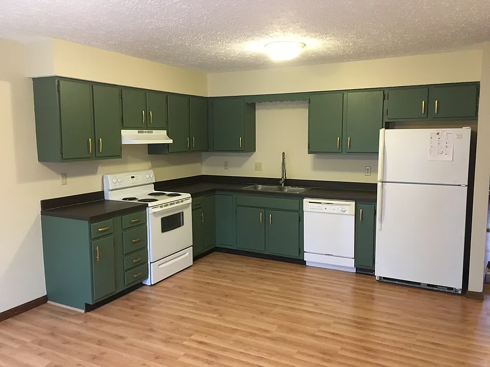 Kitchen with appliances provided. Cabinets recently resurfaced and painted.