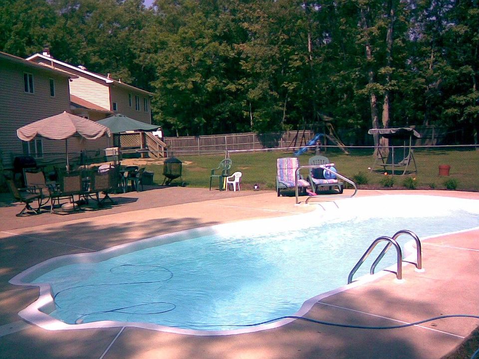 Pool and Hardscaping, before spa and river rock