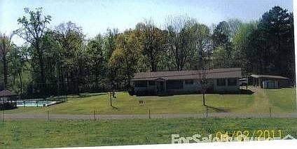 House & 2+ acres
						:
						Inground pool; detached 2 car garage; Lake is behind house through the woods.