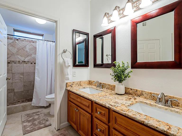 Upgraded Master Bathroom: Custom Tile and Granite