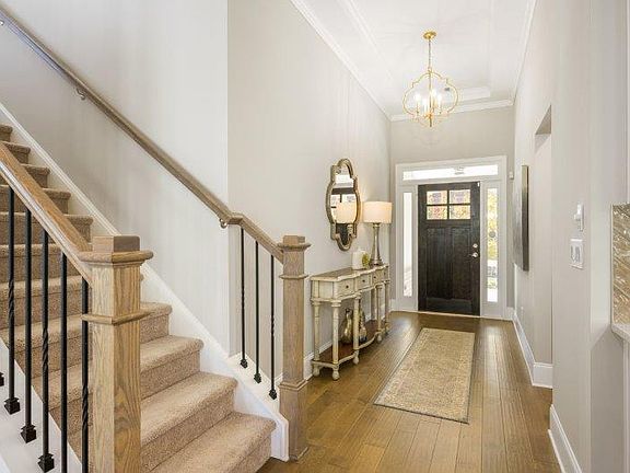 Your grand foyer! Welcome! Photo is a representation of home.