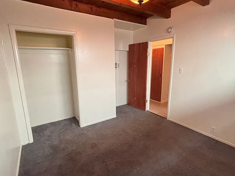 Bedroom with closet.