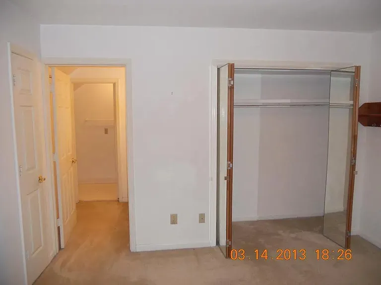 master bedroom with full bath and laundry