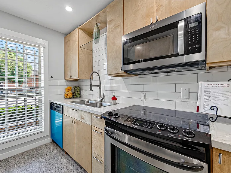 Updated kitchen, stainless steel appliances, cabinets with soft close drawers.