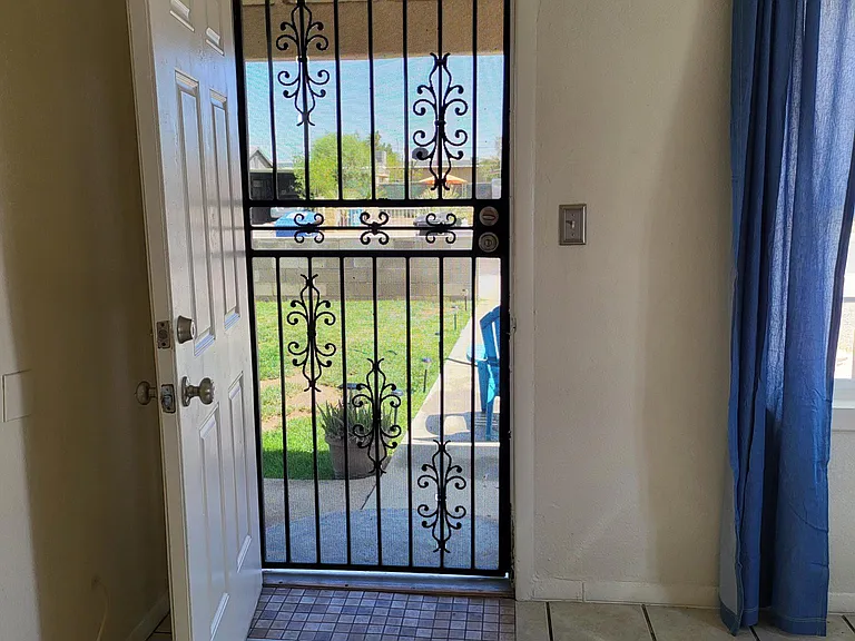 Security doors in front and in back: Open the main doors and enjoy the nice weather as fresh air is circulating throughout the house while playing your favorite music.