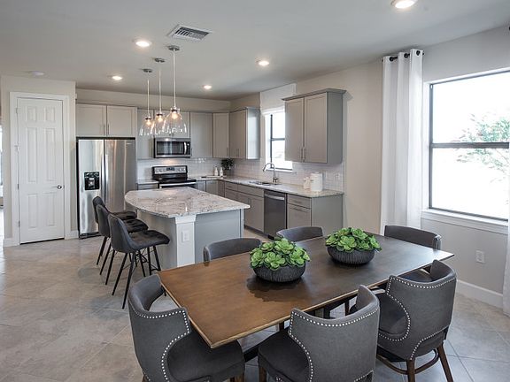 Model Representation Cafe dining space ideally located off kitchen living spaces, perfect for ent